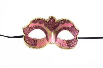 Carnival mask pink color ornate isolated on a white background.