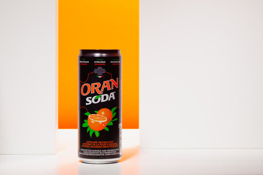 One can of Orange Soda fruit mineral water on the orange background