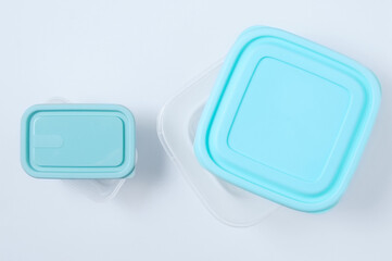 Two plastic container with  lid for food. White background.