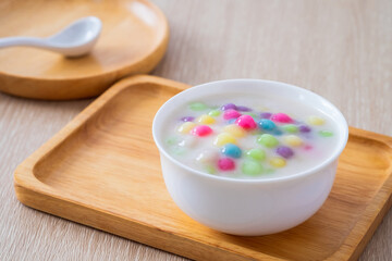 Fototapeta na wymiar Colorful ball flour in coconut milk (Bua Loi), Thai dessert.
