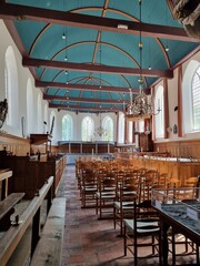 Fototapeta na wymiar Nave of the hervormde Kerk (Reformed Church) Grutte Tsjerke in (Dutch) Sloten (Frisian) Sleat, Friesland, Netherlands