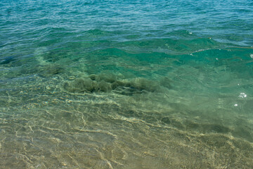 Fototapeta na wymiar Ocean and Beaches, blue water and sand