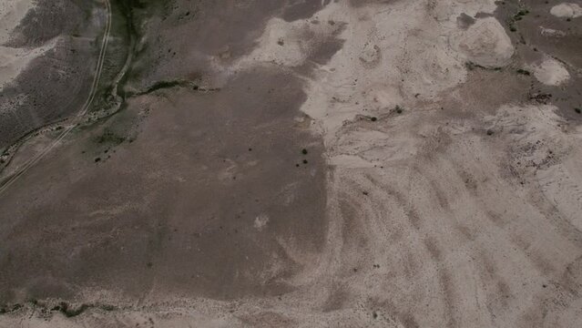 Sand dune landscape in Altai also called as Moon valley, Siberia, Russia. Beautiful summer nature landscape at during daytime. Aerial view from a drone
