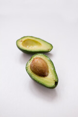 avocado cut in half. avocado on a white background