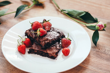 brownies with strawberries. home baking. chocolate brownie