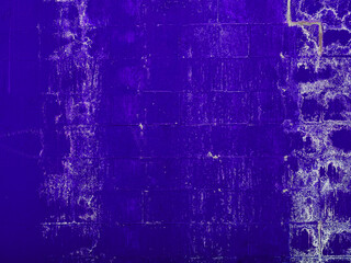 blue evening night weathered old worn painted peeling brick stone wall warehouse alley copy space