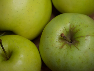 Renet simirenko green apples, top view, close-up. Macro shot of fruit.