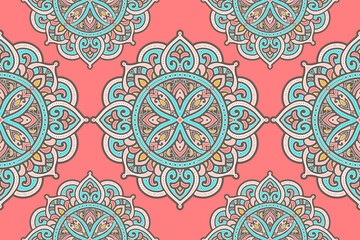 Blue, pink and brown seamless pattern with mandala ornament. Traditional Arabic, Indian motifs. Great for fabric and textile, wallpaper, packaging or any desired idea.