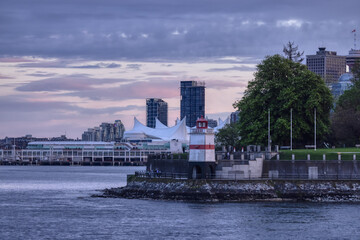 Brockton Point Lighthouse in Stanley Park, Downtown Vancouver, British Columbia, Canada. Spring Season Evening. Sunset Sky