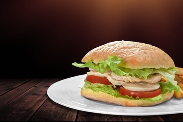 Delicious sandwich with vegetables, ham, cheese and fried toast