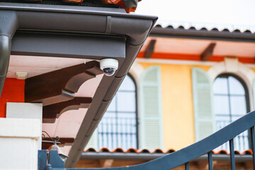 Futuristic security cameras scan the street in 4K.