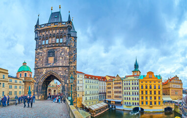 Panorama of the Old Town Bridge Tower and historic buildings from the Charles Bridge, Prague, Czech...