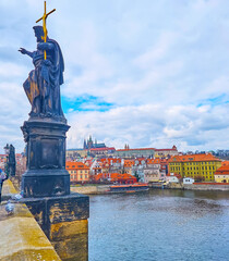 St John the Baptist sculpture on Charles Bridge, Prague, Czech Republic