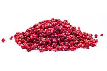 pile of pink peppercorns isolated on white background - Powered by Adobe