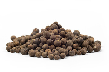 pile of allspice (pimento) isolated on white background