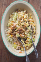 Gyros meat with corn and lettuce salad and sauce