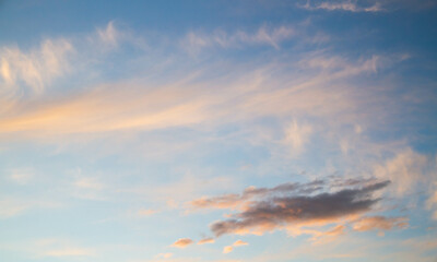 Fototapeta na wymiar Summer sky. Cumulus clouds on a blue background. Partly cloudy.
