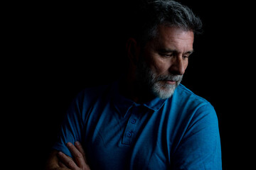 Man sitting alone felling sad worry or fear