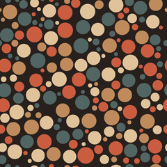 Seamless vector pattern with circles of different colors on a dark background