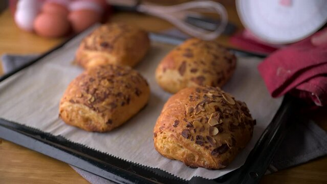freshly baked almond croissants image