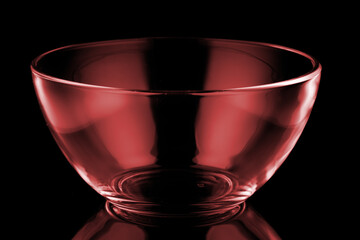 Red glass bowl in black background