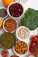 Overhead view of superfoods vegan chick pea seeds protein nuts broccoli