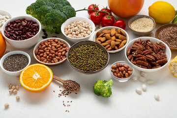 Obraz na płótnie Canvas Set of superfoods vegan chick pea seeds protein nuts broccoli chia beans