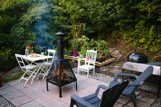 Table with fireplace on terrace
