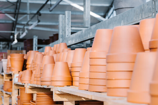 Stacks of pots on shelves