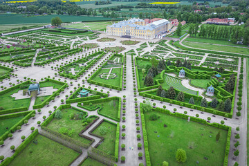 Aerial view on baroque garden of Rundale palace in summer time. Symmetrical park in vibrant green colors.