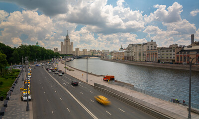 Fototapeta na wymiar Panorama of Moscow view of Kotelnicheskaya embankment from the floating bridge of Zaryadye Park