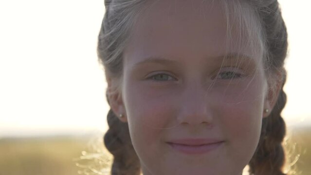 Premium Photo  Child girl sad profile face close up with hands on cheek.