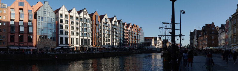 Fototapeta premium Panorama embankment Stare Misto town tourism leisure walks people European landscape Gdansk Poland