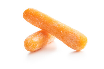Frozen baby carrot vegetable. Mini orange carrots isolated on white background.
