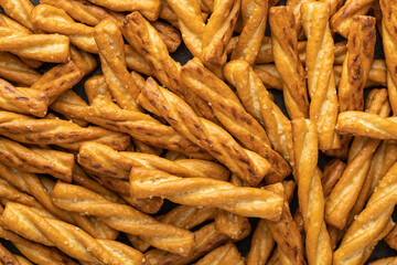 Salted pretzel sticks. Salted crackers.