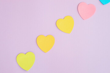 Fototapeta na wymiar Sticky notes, heart shaped, rainbow colored line.