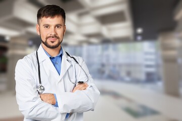 Portrait of  young doctor working in a hospital. With Stethoscope In Hospital Office.