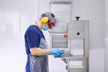 A researcher works with materials for experiments