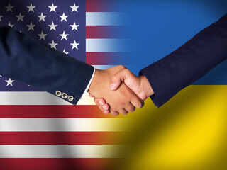 America and Ukraine's friendship concept background with a handshake. Business and support agreement backdrop