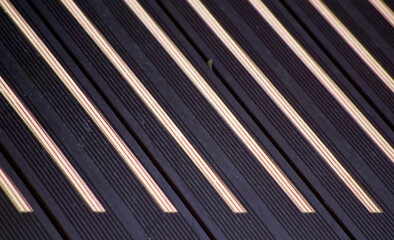 Shadows on a wood floor in a sunny day.