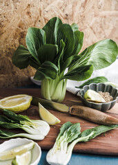 fresh herbs and spices on wooden table ASIAN CABBAGE BOK CHOY