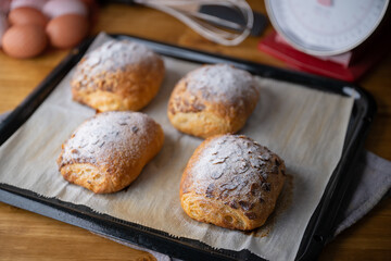 freshly baked almond croissants image