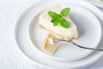 Eating cheesecake. Taking bite of cheesecake with fork