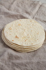 Homemade Mexican Corn Tortillas in a Stack, low angle view.