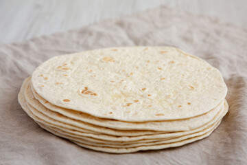 Homemade Mexican Corn Tortillas in a Stack, side view.
