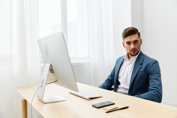 manager at the desk in the office an official Gray background