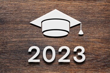 Graduation hat with number 2023 on background. Education, leaning, class 2023 concept
