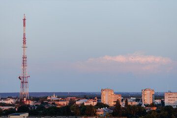 Obraz premium Beautiful sunset sky over the city. Twilight over the urban area. Aerial view. Typical modern residential area. Chernihiv. Ukraine. Horizontal photo