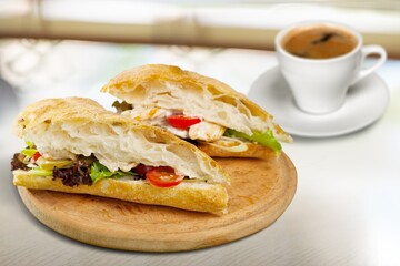 Tasty sandwich with cheese, mayonnaise and cherry tomatoes. Mediterranean appetizer. Breakfast concept.