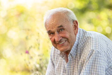 senior man smiling natural outdoors